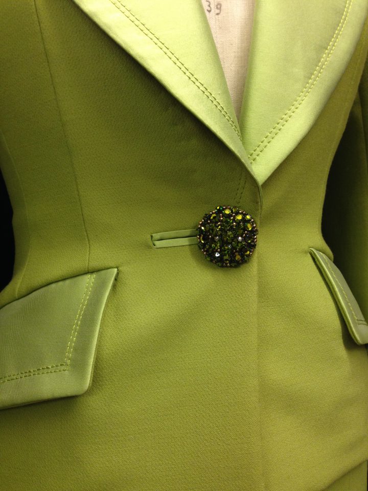 Suit in lime green wool toile trimmed with ziberline silk